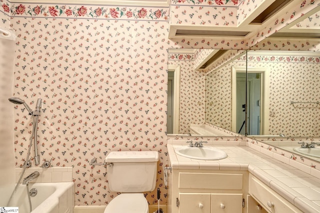 129 E Main St, Duncan, SC 29334 - bathroom with wallpapered walls, a bathtub, toilet, and vanity
