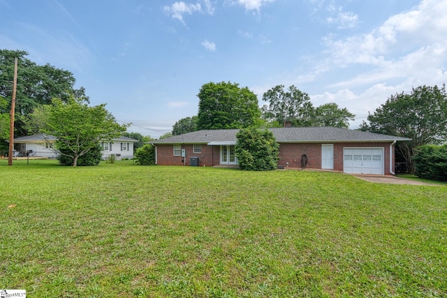 129 E Main St, Duncan, SC 29334 - ranch-style house with an attached garage, brick siding, a front lawn, and a chimney