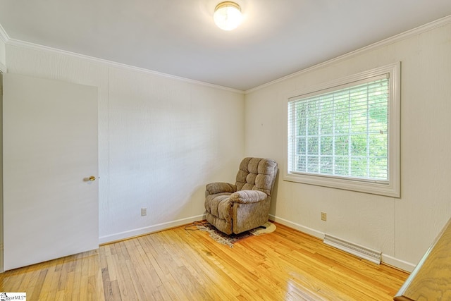 129 E Main St, Duncan, SC 29334 - living area with light wood-type flooring, crown molding, and baseboards
