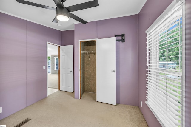 118 Quail Rd, Ninety Six, SC 29666 - unfurnished bedroom with light carpet, ceiling fan, ornamental molding, and a closet