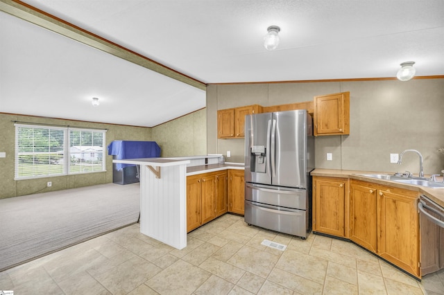 118 Quail Rd, Ninety Six, SC 29666 - kitchen featuring appliances with stainless steel finishes, a peninsula, lofted ceiling, a sink, and open floor plan