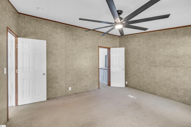 118 Quail Rd, Ninety Six, SC 29666 - spare room featuring ceiling fan, carpet flooring, and crown molding