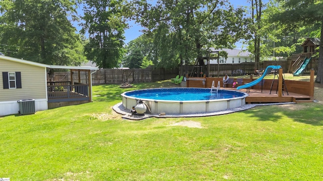 118 Quail Rd, Ninety Six, SC 29666 - view of swimming pool featuring a deck, cooling unit, and a playground