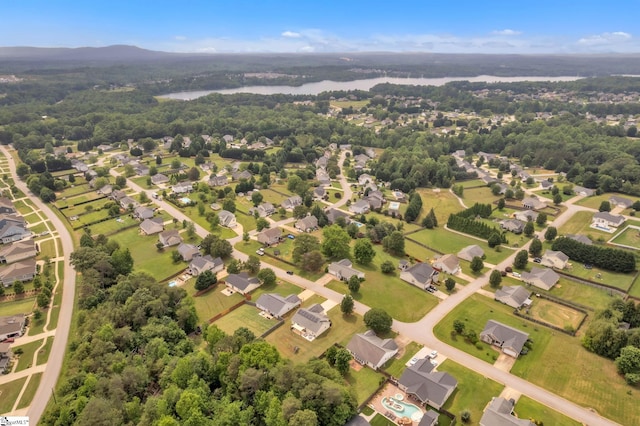205 Glastonbury Dr, Greer, SC 29651 - aerial view of property and surrounding area featuring a large body of water and nearby suburban area