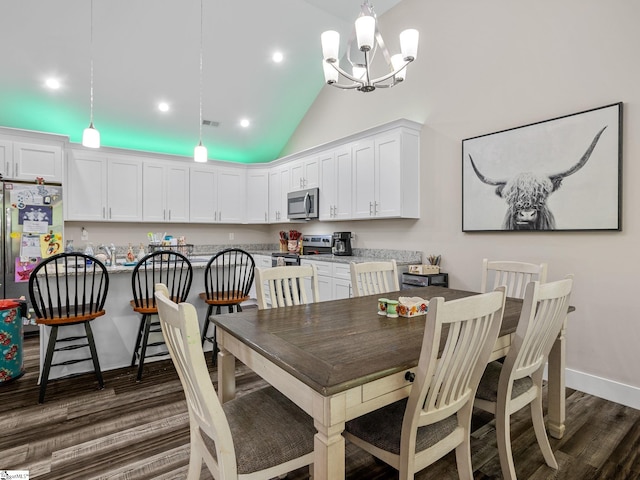 225 Aldrich Rd, Chesnee, SC 29323 - dining room with dark wood-style floors, lofted ceiling, a chandelier, recessed lighting, and baseboards