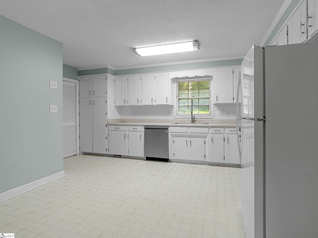 221 N Hill Dr, Boiling Springs, SC 29316 - kitchen with freestanding refrigerator, dishwasher, light countertops, a sink, and a textured ceiling