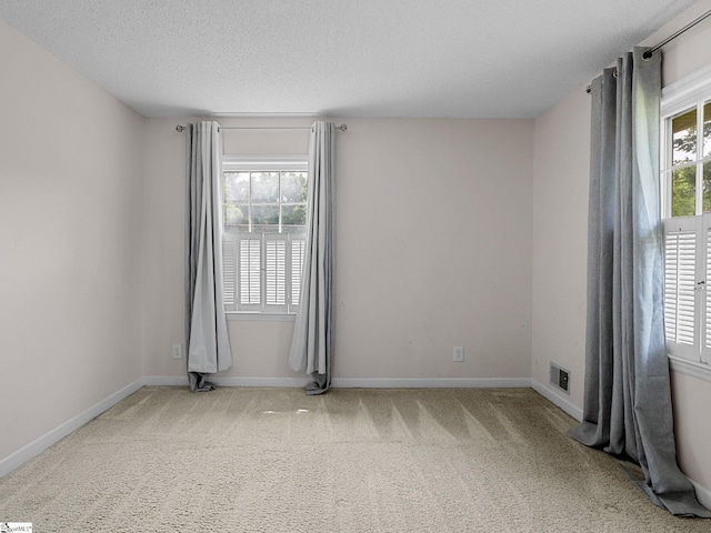 221 N Hill Dr, Boiling Springs, SC 29316 - spare room with carpet floors, a textured ceiling, and baseboards