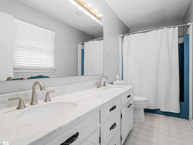 221 N Hill Dr, Boiling Springs, SC 29316 - bathroom featuring toilet, tile patterned floors, double vanity, and a textured ceiling