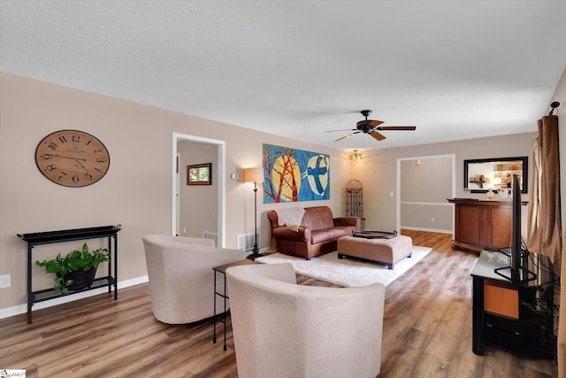 108 Hancock Ln, Greer, SC 29650 - living room featuring wood finished floors, ceiling fan, and baseboards