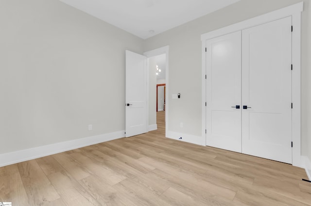 120 Thomason View Rd, Fountain Inn, SC 29644 - unfurnished bedroom featuring light wood finished floors, baseboards, and a closet