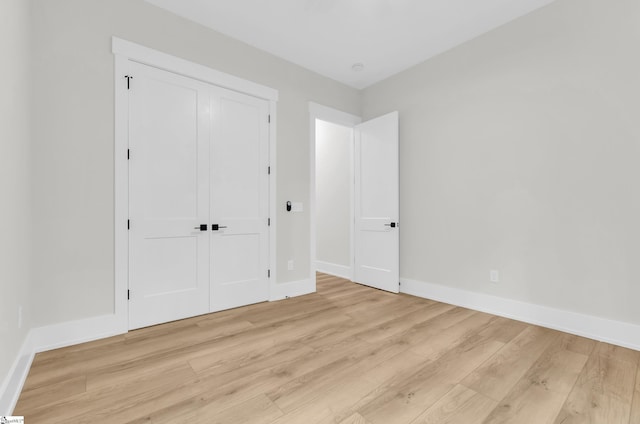 120 Thomason View Rd, Fountain Inn, SC 29644 - unfurnished bedroom featuring light wood finished floors, baseboards, and a closet