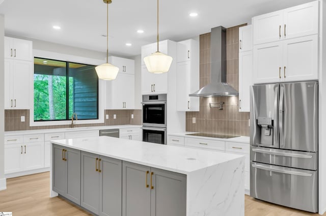 120 Thomason View Rd, Fountain Inn, SC 29644 - kitchen featuring stainless steel appliances, wall chimney range hood, gray cabinetry, white cabinetry, and recessed lighting