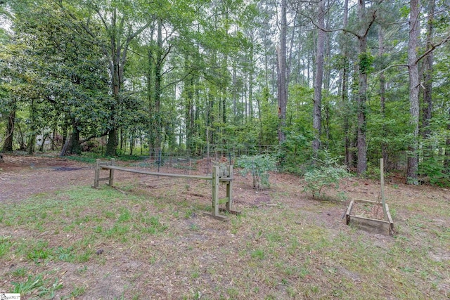 2444 Abner Creek Rd, Duncan, SC 29334 - view of yard featuring a garden and a view of trees