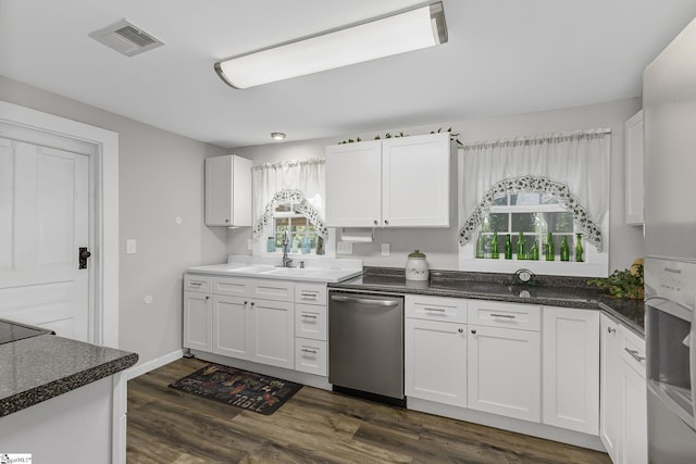 2444 Abner Creek Rd, Duncan, SC 29334 - kitchen featuring stainless steel dishwasher, plenty of natural light, and white cabinets