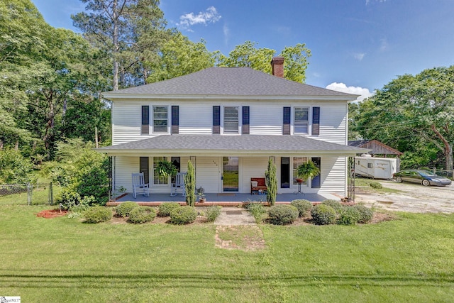 600 Gulliver St, Fountain Inn, SC 29644 - view of front of property with a chimney, a shingled roof, and a porch