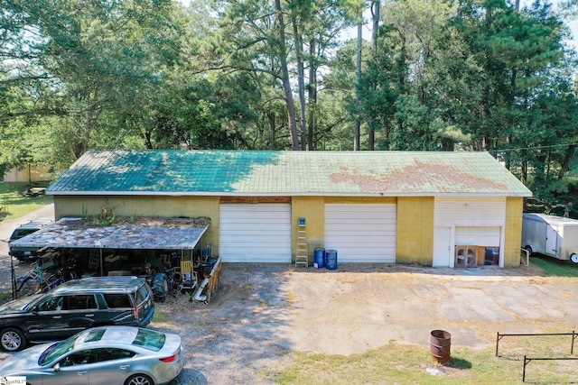 600 Gulliver St, Fountain Inn, SC 29644 - garage featuring a detached garage and view of scattered trees