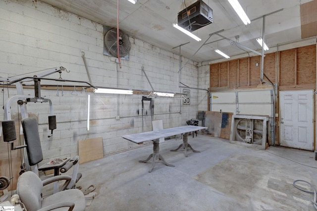 600 Gulliver St, Fountain Inn, SC 29644 - garage with a garage door opener and concrete block wall