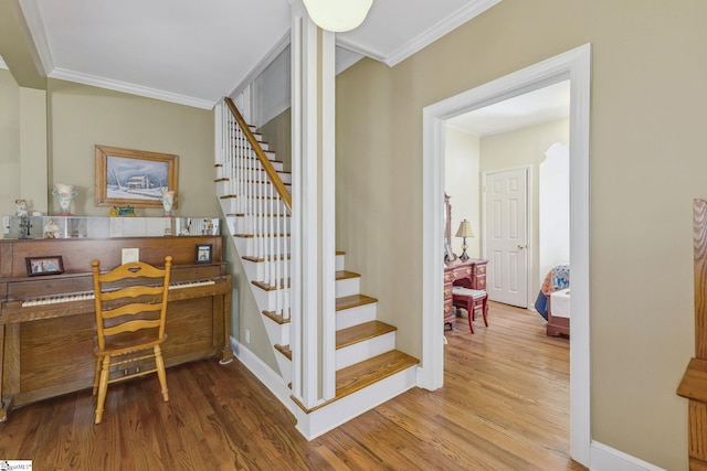 600 Gulliver St, Fountain Inn, SC 29644 - staircase with wood finished floors, ornamental molding, and baseboards