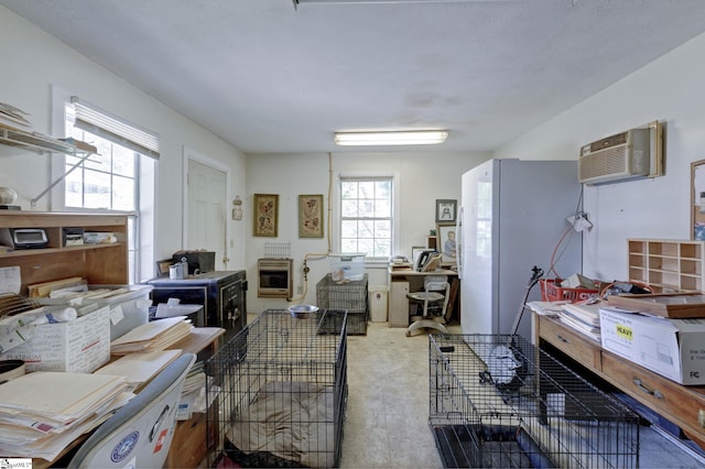 600 Gulliver St, Fountain Inn, SC 29644 - kitchen with heating unit, a wall mounted air conditioner, an office area, and carpet floors