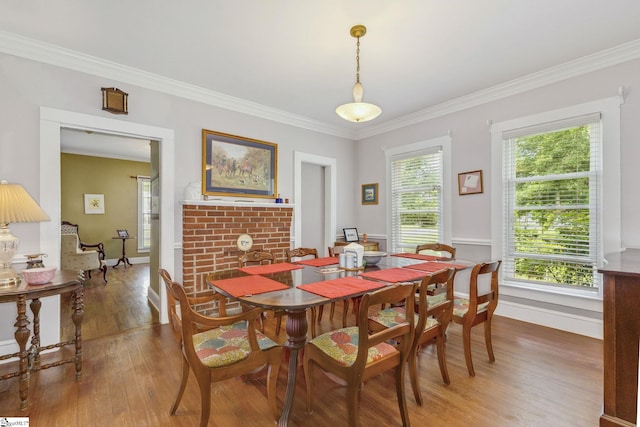 600 Gulliver St, Fountain Inn, SC 29644 - dining space featuring light wood-type flooring, ornamental molding, and baseboards