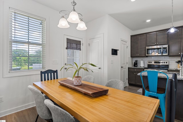 508 W D Ave, Easley, SC 29640 - dining room with dark wood-style flooring, baseboards, a chandelier, and recessed lighting