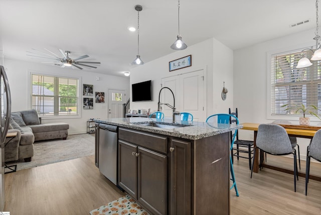 508 W D Ave, Easley, SC 29640 - kitchen featuring a sink, stainless steel dishwasher, open floor plan, and dark brown cabinetry