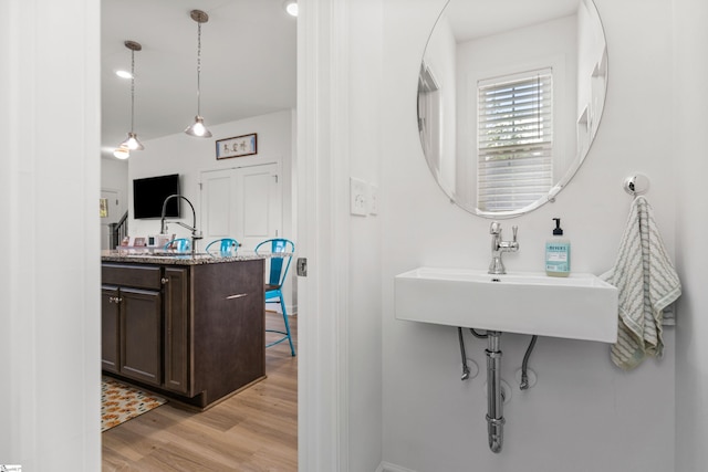 508 W D Ave, Easley, SC 29640 - bathroom featuring wood finished floors, a sink, and baseboards
