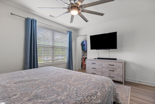 508 W D Ave, Easley, SC 29640 - bedroom featuring light wood-style flooring, baseboards, a closet, and a ceiling fan