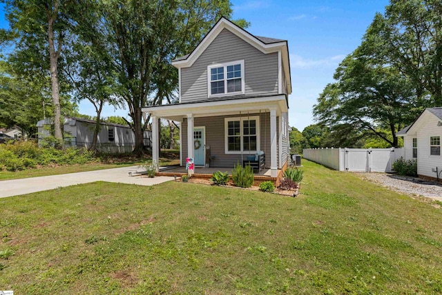 508 W D Ave, Easley, SC 29640 - traditional home featuring a gate, covered porch, central air condition unit, and driveway