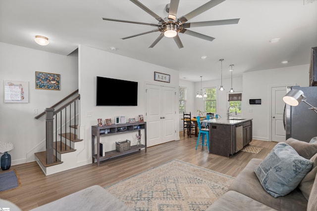 508 W D Ave, Easley, SC 29640 - living area with light wood finished floors, ceiling fan, stairway, recessed lighting, and baseboards