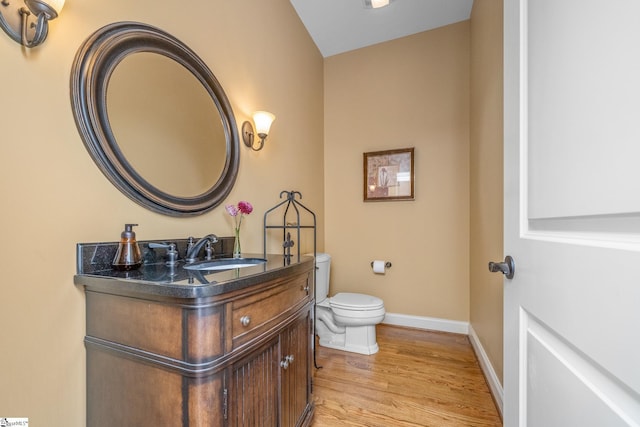 204 Whitworth Way, Simpsonville, SC 29681 - half bath with toilet, vanity, baseboards, and wood finished floors