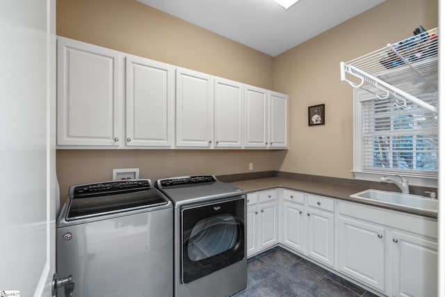 204 Whitworth Way, Simpsonville, SC 29681 - laundry room featuring cabinet space, washing machine and dryer, and dark tile patterned floors