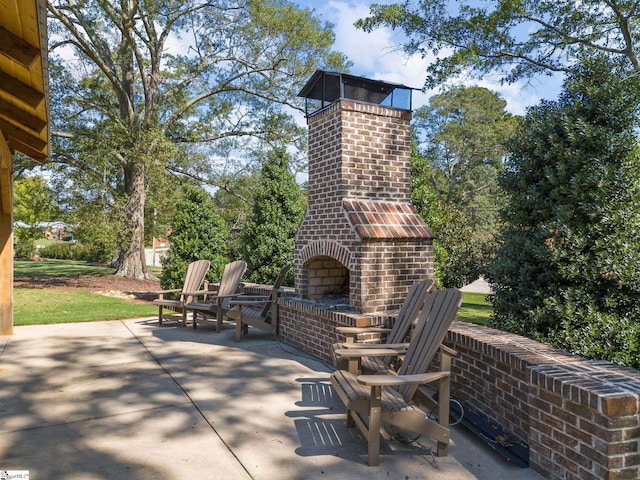 514 Olivia Springs Dr, Spartanburg, SC 29302 - view of patio / terrace featuring an outdoor brick fireplace
