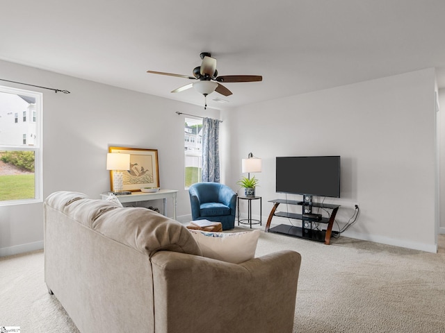 514 Olivia Springs Dr, Spartanburg, SC 29302 - living room featuring light carpet, baseboards, and a ceiling fan
