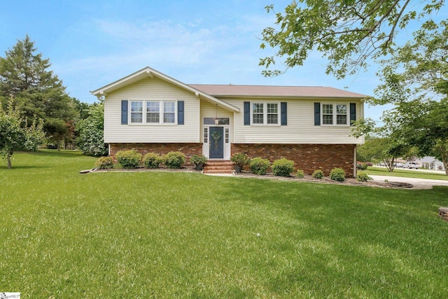 4600 Coach Hill Dr, Greenville, SC 29615 - bi-level home with a front yard and brick siding