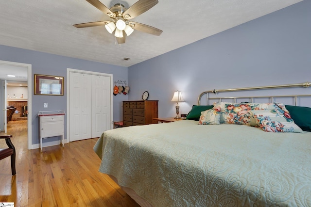 4600 Coach Hill Dr, Greenville, SC 29615 - bedroom with light wood-type flooring, a closet, a ceiling fan, and baseboards