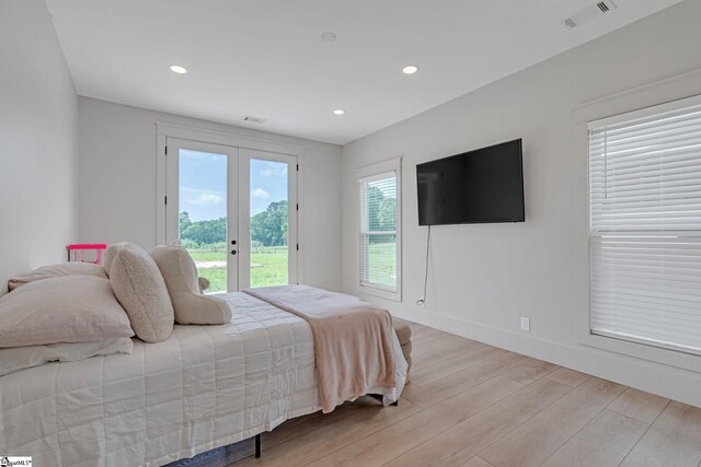 320 Terry Rd, Fountain Inn, SC 29644 - bedroom featuring french doors, access to outside, light wood finished floors, recessed lighting, and baseboards
