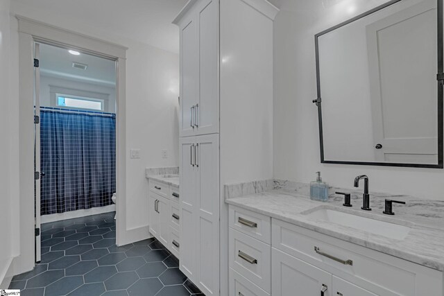 320 Terry Rd, Fountain Inn, SC 29644 - bathroom with vanity, toilet, tile patterned floors, and a shower with curtain