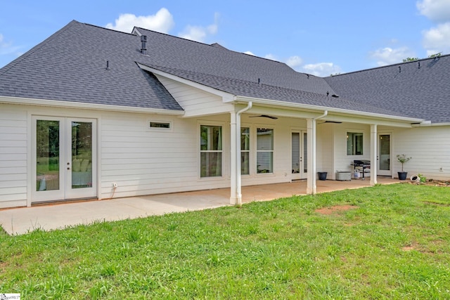 320 Terry Rd, Fountain Inn, SC 29644 - back of house featuring a shingled roof, a ceiling fan, a yard, and a patio