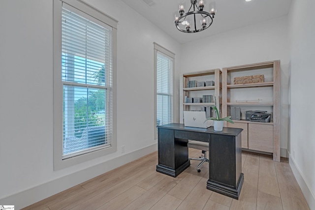 320 Terry Rd, Fountain Inn, SC 29644 - home office featuring a chandelier, plenty of natural light, light wood-style flooring, and baseboards
