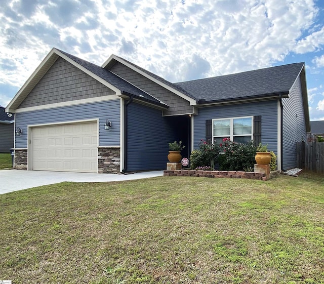 110 Patagonia Rd, Anderson, SC 29625 - view of front of home with an attached garage, concrete driveway, and stone siding