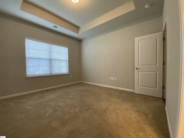110 Patagonia Rd, Anderson, SC 29625 - carpeted empty room with a raised ceiling, baseboards, and a smoke detector