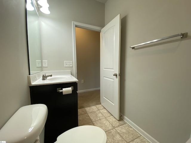 110 Patagonia Rd, Anderson, SC 29625 - bathroom with toilet, vanity, baseboards, and tile patterned floors