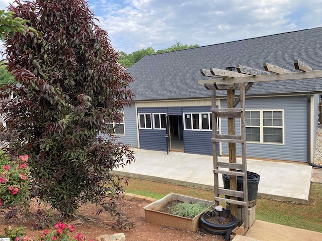 110 Patagonia Rd, Anderson, SC 29625 - back of house featuring a shingled roof, a patio, and a pergola