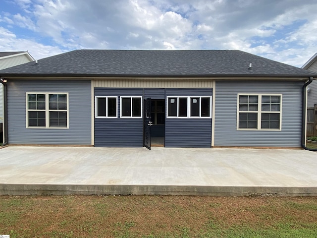 110 Patagonia Rd, Anderson, SC 29625 - back of house with a patio area and roof with shingles