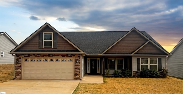 739 Shelburne Ln, Lyman, SC 29365 - craftsman inspired home featuring concrete driveway, stone siding, a front yard, and a shingled roof