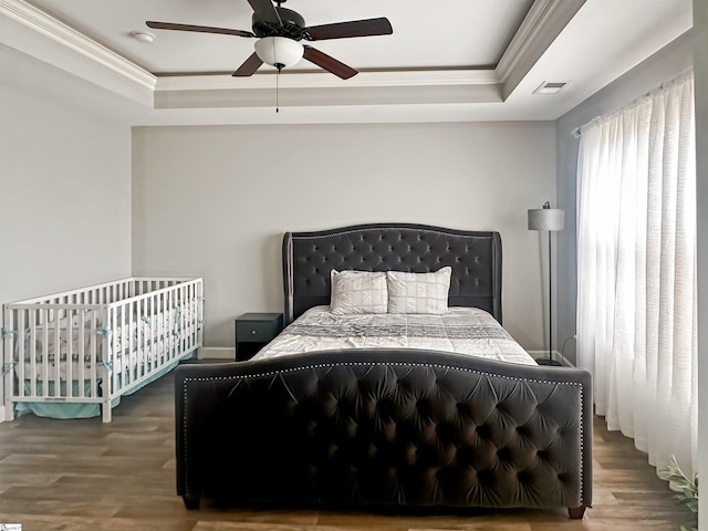 739 Shelburne Ln, Lyman, SC 29365 - bedroom with a raised ceiling, ornamental molding, wood finished floors, and ceiling fan