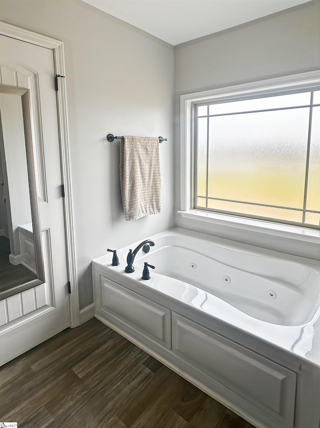 739 Shelburne Ln, Lyman, SC 29365 - bathroom with a whirlpool tub and wood finished floors