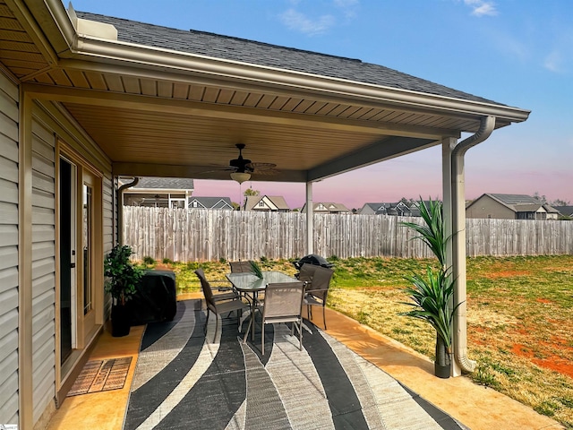 739 Shelburne Ln, Lyman, SC 29365 - fenced backyard featuring outdoor dining space, a ceiling fan, and a patio