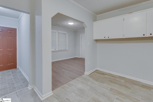 1709 Lyndon Ave, Anderson, SC 29624 - entrance foyer featuring crown molding, arched walkways, and baseboards